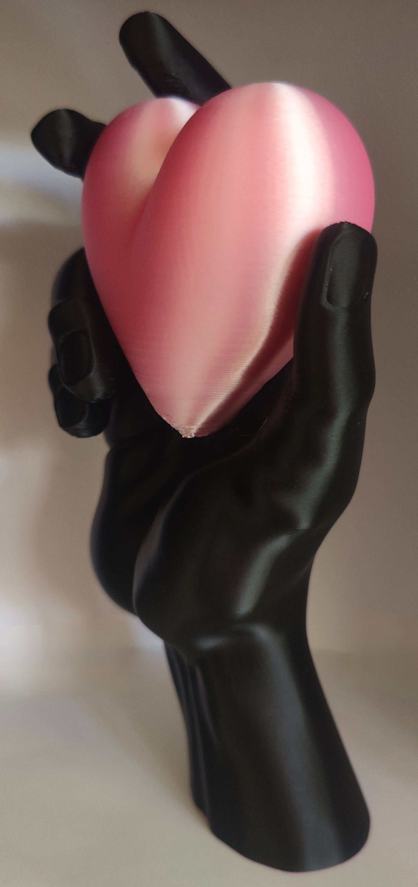 Held Heart Sculpture Matte Black & Soft Pink