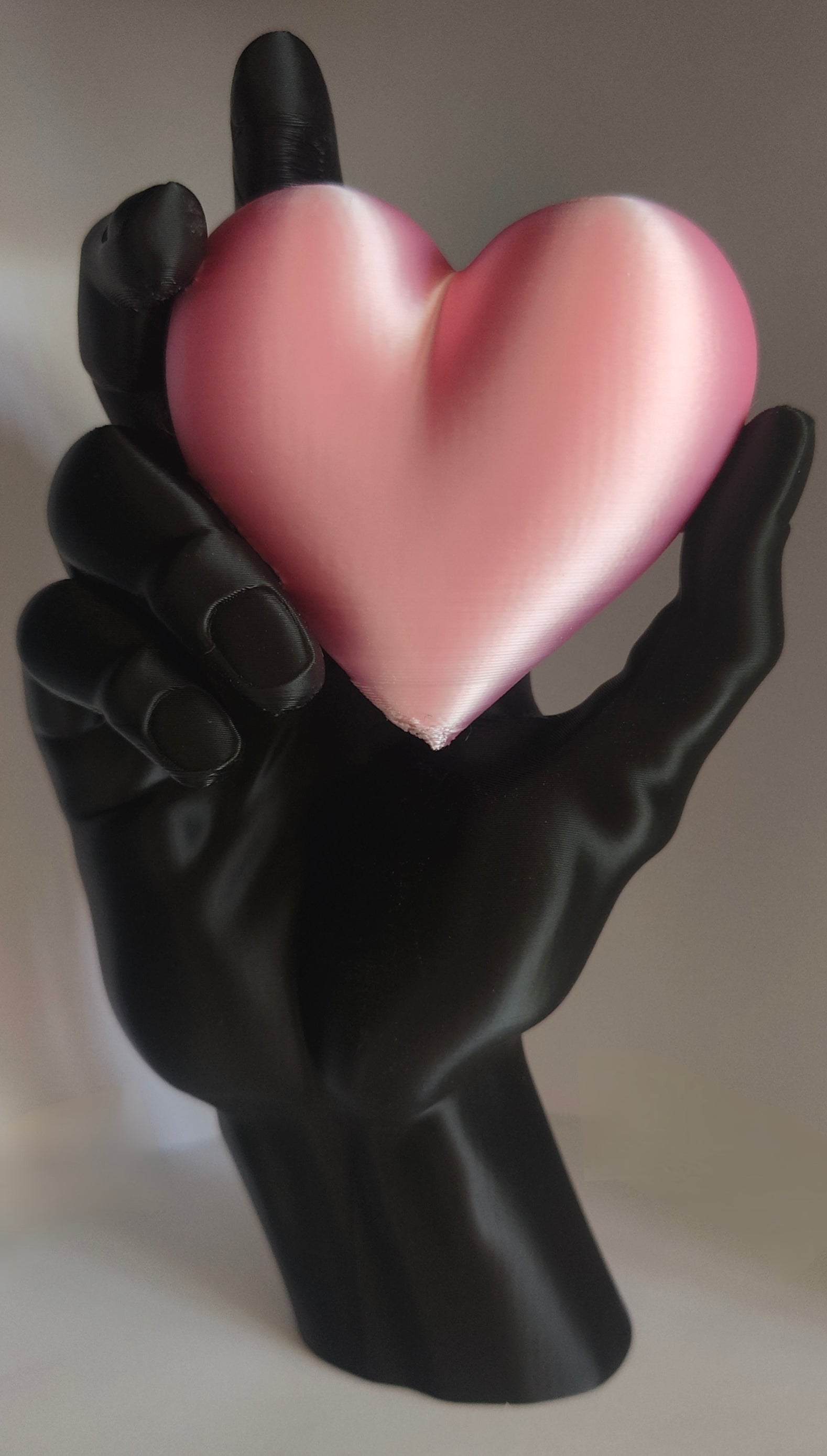 Held Heart Sculpture Matte Black & Soft Pink