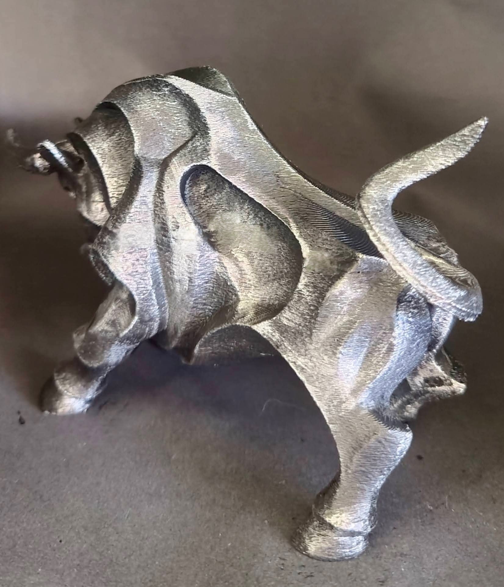 Charging Bull Sculpture

Metallic Stone Finish